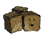 a cluster of three croutons with an excited face